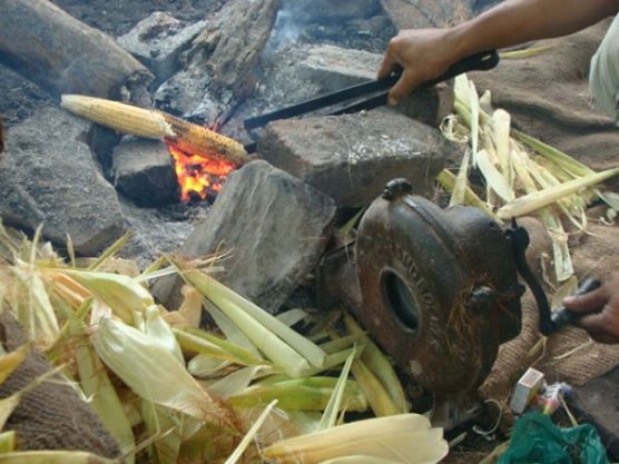 Locals using kinetic energy to cook corn!